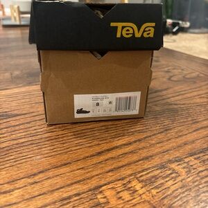 Teva Box with Yellow Logo on Black and Brown Cardboard
